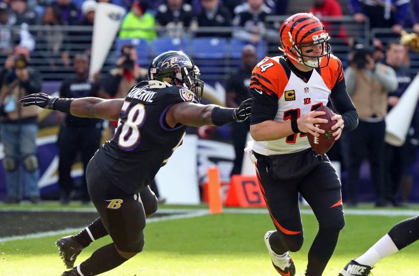 9709198-andy-dalton-elvis-dumervil-nfl-cincinnati-bengals-baltimore-ravens-850x560
