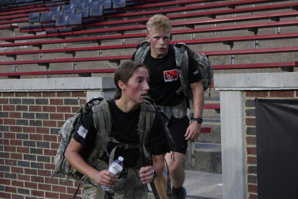 Army cadets pacing themselves halfway through the memorial stair run.